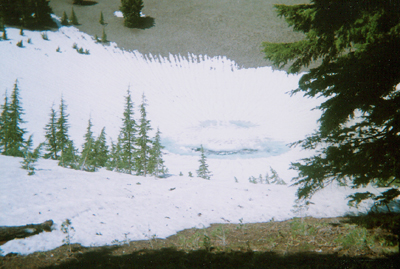 Smiley Face in snow inside crater