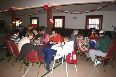 Families fellowship over dinner