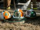 st_pats_river_helmets_on_hose.jpg