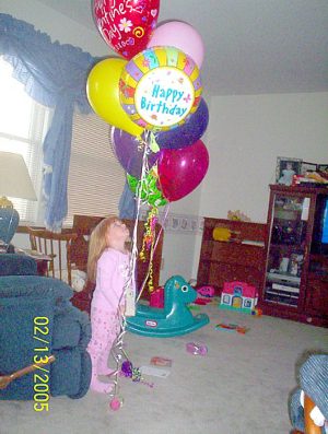 Gabby_and_her_Happy_Birthday_balloons.jpg