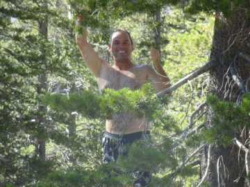 Mark tries out the shower facilities in camp