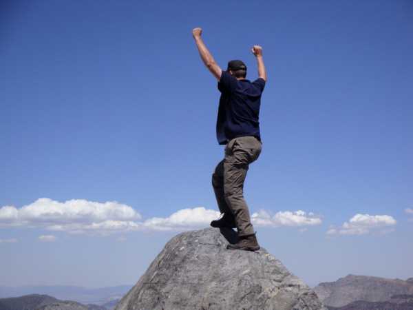 Ben surmounts a boulder
