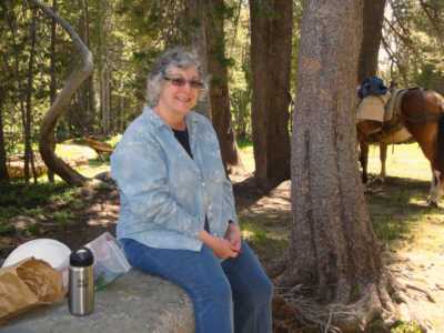 Kathie relaxes during lunch break at Tenaya Lake
