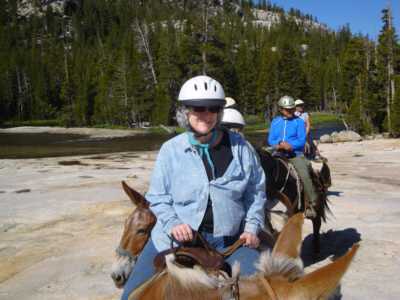 Kathie as we approach a riverside lunch spot at the southwest corner of Tuolumne Meadows