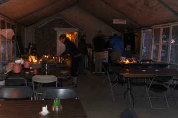 Cleanup after dinner as it grows dark