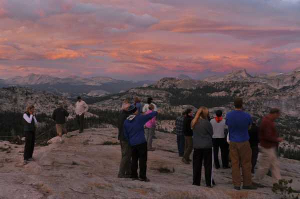 Sunset brings up the entire camp after dinner, dessert in hand