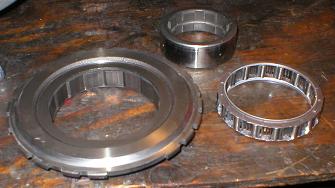 The low reverse clutch support bearing carrier and inside race in pieces on the bench