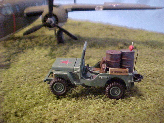 Close-up of the "Russian" Willys Jeep. I'm not entirely sure they would have had Jeeps at this time via Lend-Lease, but I couldn't find Russian fuel trucks in 1/72 scale. I painted some styrene strip to look like wood and printed out decals that say the Russian equivalent of "No Smoking" to put on the front and sides.