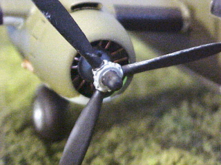 I detailed the engines with bits of copper wire to make them stand out a little more. One important point, the Raider's propellers did not have yellow tips. This detail has tripped a lot of Raider modelers up. I drybrushed some aluminum paint along the leading edges to show the wear of the long flight.
