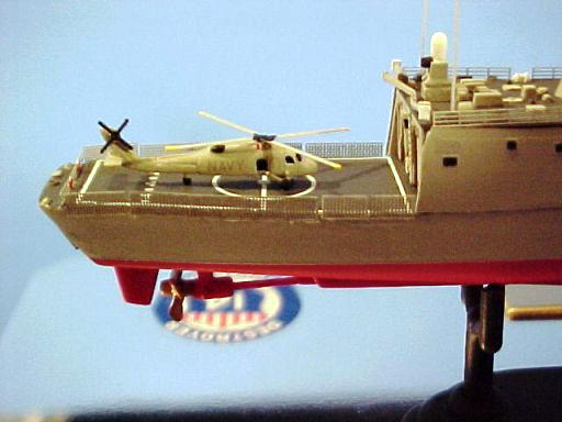 Close-up of the SH-60 anti-submarine helicopter on the stern. The photoetched rotor blades are much more realistic than the thick, rounded plastic ones in the kit. I had to use my No. 15/0 brush to paint the windows and exhaust exits black, and the exhaust inlets red to simulate the covers placed over them. Little details, sure, but they all add up for a nice effect.