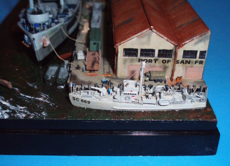 Close-up of the sub chaser, showing a few of the details added, including a life ring, hose rack, bridge details, searchlight, scratchbuilt mast and stretched sprue rigging.