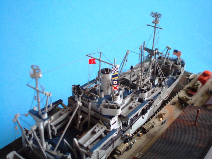 Close-up of the flying bridge and masts. The signal flags spell out NDWV, the Lenawee's call sign, while the red 'Baker' flag signifies she is loading dangerous cargo. All the topmasts were made from brass rod and cyanoacrylate glue, rigged with stretched sprue. Signal halyards are paintbrush bristles.