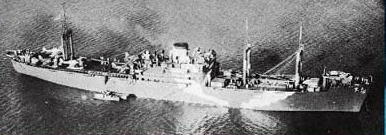 Kimikawa Maru in her white over gray arctic camouflage scheme, somewhere in the North Pacific.