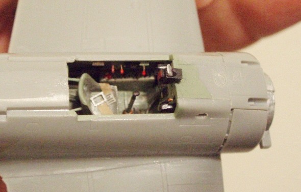 Lefthand side of the cockpit shows the various throttle and mixture control handles.