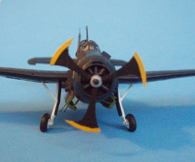 Front view of the Avenger shows the engine detail added with bits of styrene rod for the cylinder heads and the propeller governor, topped off with the 1/144 scale PropBlur and scratchbuilt propeller hub. I also opened the cowl flaps.