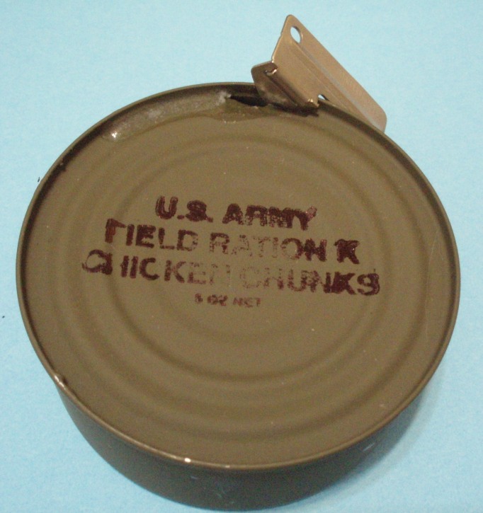 US 10-in-1 ration M-unit chicken can being opened with P-38.