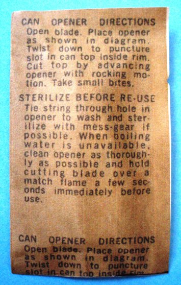 US P-38 can opener wrapper, back.