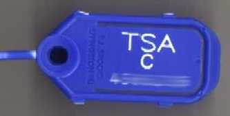TSA baggage inspection tag - serial number obscured to deter further harassment from the TSA.