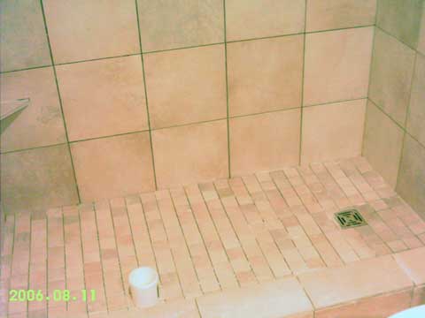 Day 5 shower floor tiles & drain