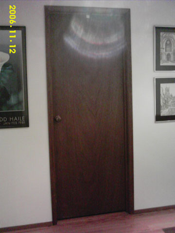 Larger door casings frame the doors.