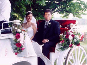 chad_and_ulrike_in_carriage_after_wedding.jpg