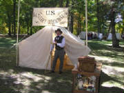 Sanitary Agent emerging from his tent