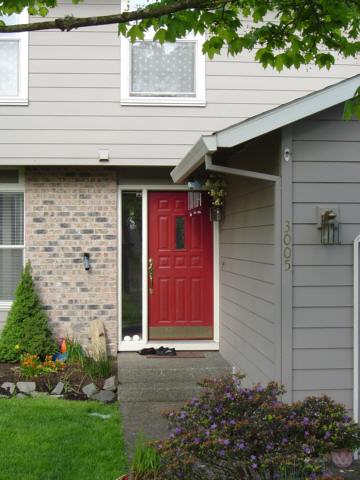 Front door, left of the garage