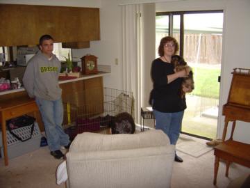 Kathie and Tansy supervise the movers take a break