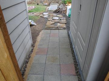 Walkway along garden shed