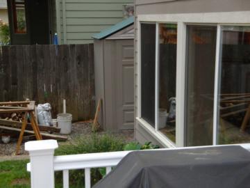 Ugly garden shed seen from deck...